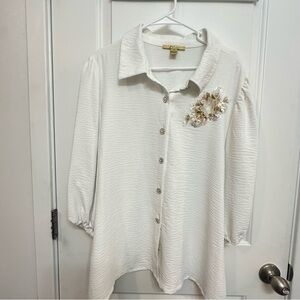 Elegant White Button-Up Top with Floral Accent